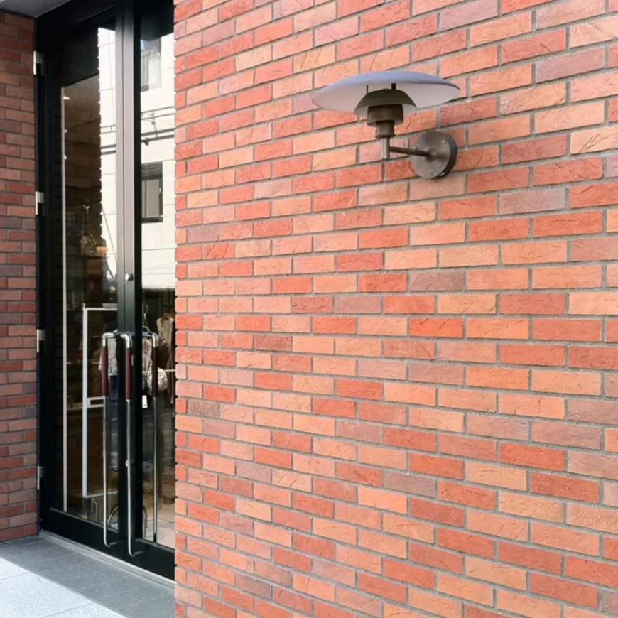 Louis Poulsen PH utendørs vegglampe - Børstet kobber